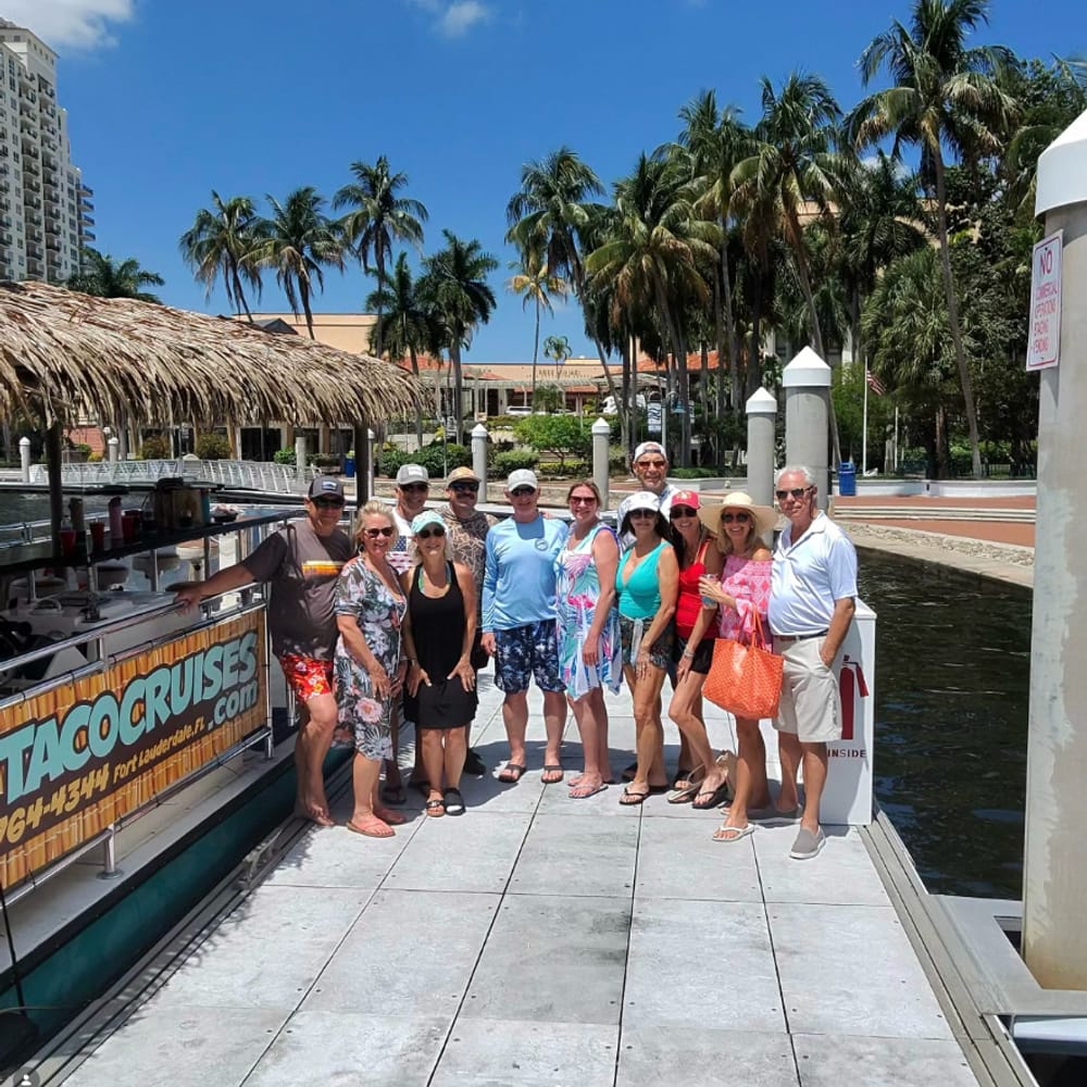Guests boarding a Tiki Taco cruise at the dock in Fort Lauderdale