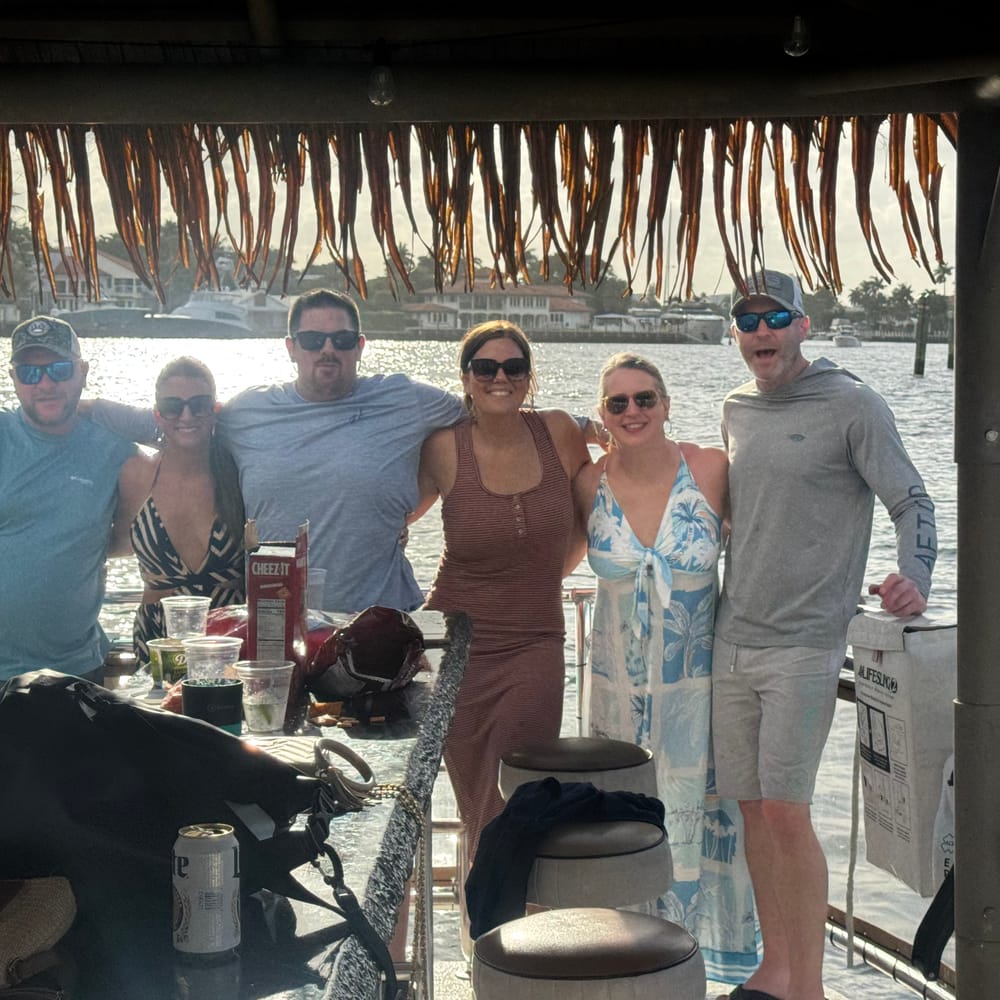 Group enjoying a sunset Tiki Taco cruise